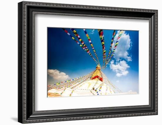 Prayer flags and Buddhist stupa at Bouddha (Boudhanath), UNESCO World Heritage Site, Kathmandu, Nep-Laura Grier-Framed Photographic Print