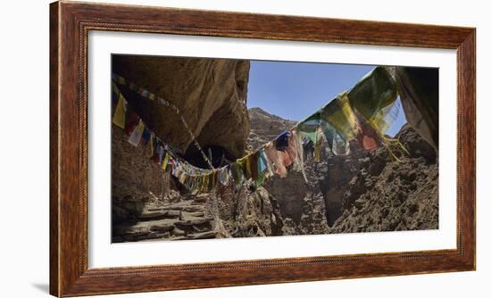 Prayer flags at the entrance of Chhungsi Cave, Mustang District, Gandaki Pradesh, Nepal-Panoramic Images-Framed Photographic Print