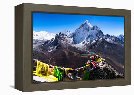 Prayer flags in Himalayas, Nepal with Ama Dablam mountain from high elevation with snow and lake-David Chang-Framed Premier Image Canvas