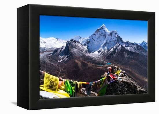 Prayer flags in Himalayas, Nepal with Ama Dablam mountain from high elevation with snow and lake-David Chang-Framed Premier Image Canvas