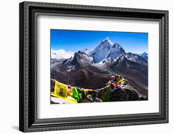 Prayer flags in Himalayas, Nepal with Ama Dablam mountain from high elevation with snow and lake-David Chang-Framed Photographic Print