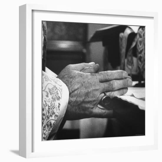 Praying Hands of Monk Churchman Resting on Table During Mass at St. Benedict's Abbey-Gordon Parks-Framed Premium Photographic Print