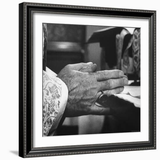 Praying Hands of Monk Churchman Resting on Table During Mass at St. Benedict's Abbey-Gordon Parks-Framed Photographic Print