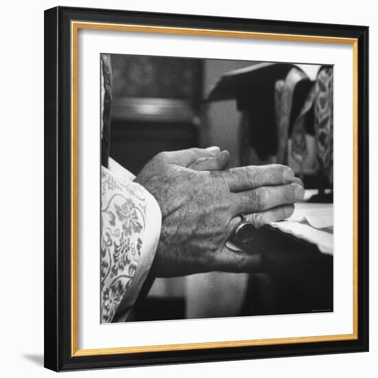 Praying Hands of Monk Churchman Resting on Table During Mass at St. Benedict's Abbey-Gordon Parks-Framed Photographic Print