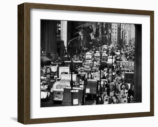 Pre-Christmas Holiday Traffic on 57th Avenue, Teeming with Double Decker Busses, Trucks and Cars-Andreas Feininger-Framed Photographic Print