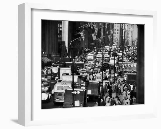 Pre-Christmas Holiday Traffic on 57th Avenue, Teeming with Double Decker Busses, Trucks and Cars-Andreas Feininger-Framed Photographic Print