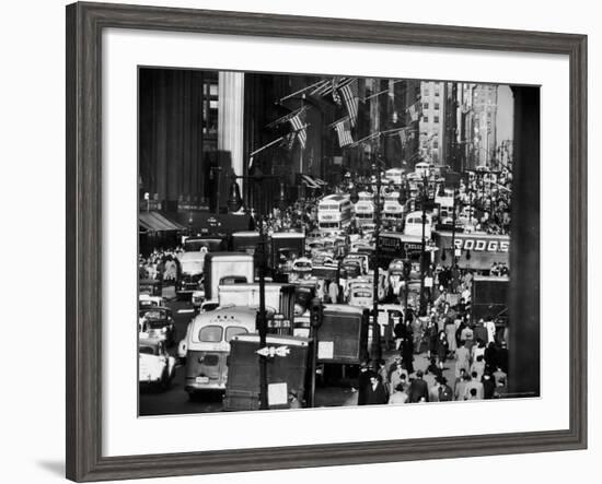 Pre-Christmas Holiday Traffic on 57th Avenue, Teeming with Double Decker Busses, Trucks and Cars-Andreas Feininger-Framed Photographic Print