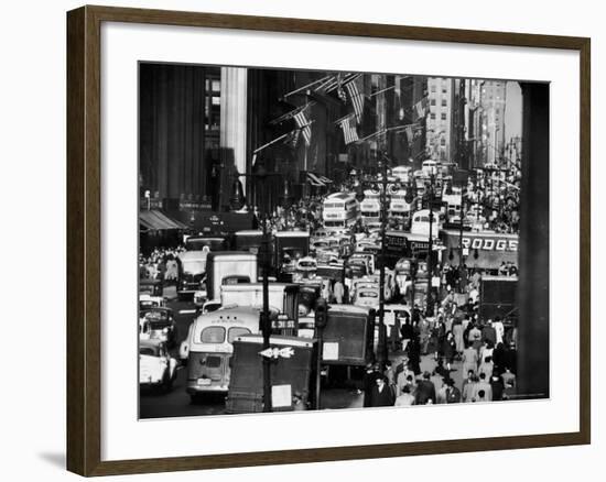 Pre-Christmas Holiday Traffic on 57th Avenue, Teeming with Double Decker Busses, Trucks and Cars-Andreas Feininger-Framed Photographic Print
