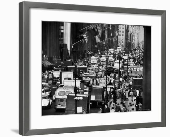 Pre-Christmas Holiday Traffic on 57th Avenue, Teeming with Double Decker Busses, Trucks and Cars-Andreas Feininger-Framed Photographic Print