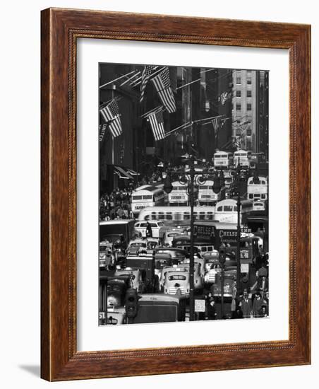 Pre-Christmas Holiday Traffic on 57th Avenue, Teeming with Double Decker Busses, Trucks and Cars-Andreas Feininger-Framed Photographic Print