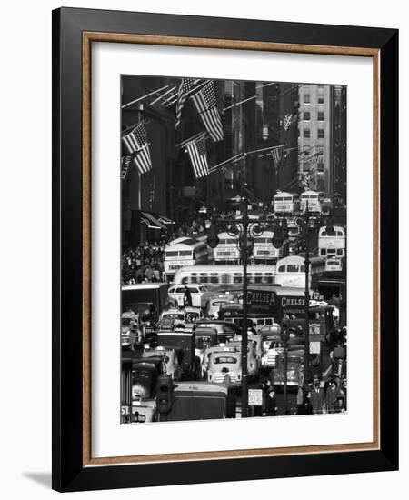 Pre-Christmas Holiday Traffic on 57th Avenue, Teeming with Double Decker Busses, Trucks and Cars-Andreas Feininger-Framed Photographic Print