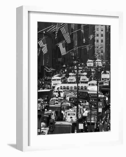 Pre-Christmas Holiday Traffic on 57th Avenue, Teeming with Double Decker Busses, Trucks and Cars-Andreas Feininger-Framed Photographic Print