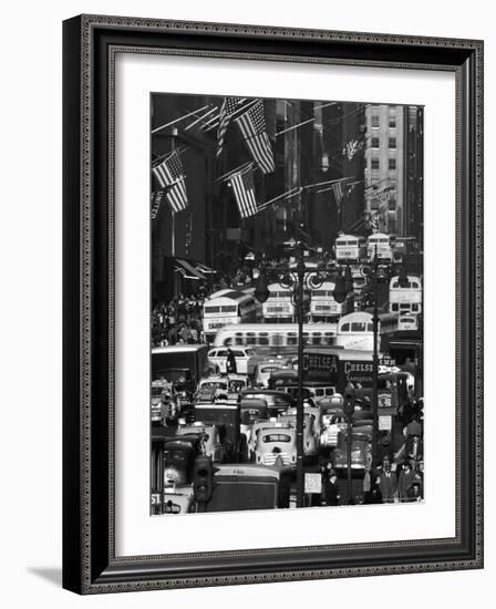 Pre-Christmas Holiday Traffic on 57th Avenue, Teeming with Double Decker Busses, Trucks and Cars-Andreas Feininger-Framed Photographic Print