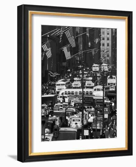 Pre-Christmas Holiday Traffic on 57th Avenue, Teeming with Double Decker Busses, Trucks and Cars-Andreas Feininger-Framed Photographic Print