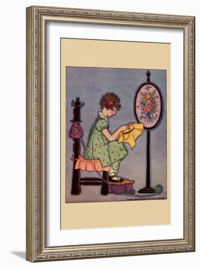 Pre-Teen Cross-Stitches a Fabric-null-Framed Art Print