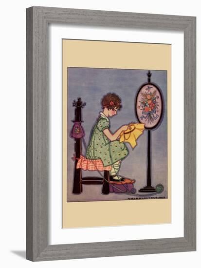 Pre-Teen Cross-Stitches a Fabric-null-Framed Art Print