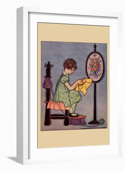 Pre-Teen Cross-Stitches a Fabric-null-Framed Art Print