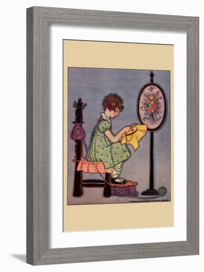 Pre-Teen Cross-Stitches a Fabric-null-Framed Art Print