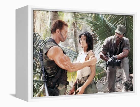 PREDATOR, 1987 directed by JOHN McTIERNAN Arnold Scharzenegger, Elpidia Carrillo and Carl Weathers -null-Framed Stretched Canvas
