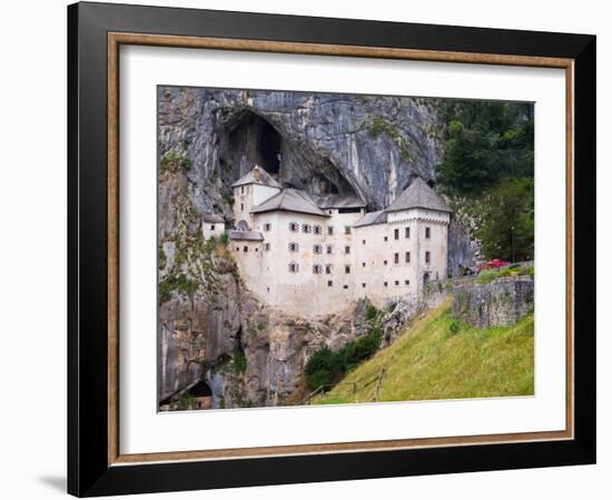 Predjama, Inner Carniola, Slovenia. Predjama Castle, built into the opening of a cave.-null-Framed Photographic Print