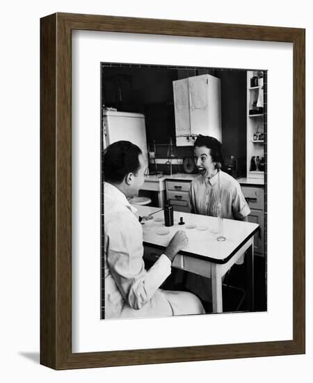 Pregnant Mrs. Jane Dill, After Being Told the Chemical Wafer on Tongue Indicates Baby is a Girl-Wallace Kirkland-Framed Photographic Print