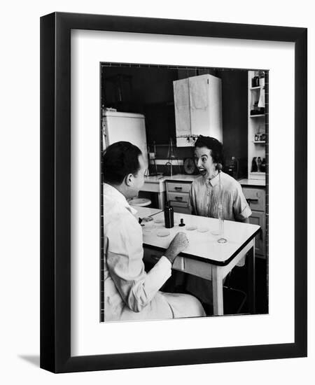 Pregnant Mrs. Jane Dill, After Being Told the Chemical Wafer on Tongue Indicates Baby is a Girl-Wallace Kirkland-Framed Photographic Print