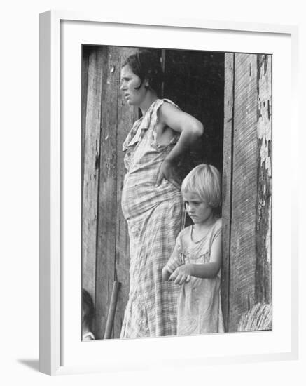 Pregnant Sharecropper's Wife Standing in Doorway of Wooden Shack with Daughter, the Depression-Arthur Rothstein-Framed Photographic Print