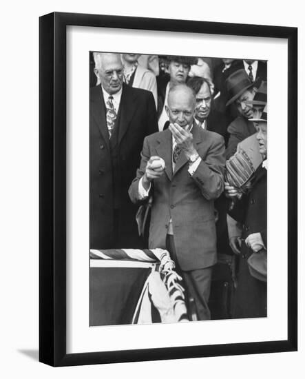 Pres. Dwight D. Eisenhower, Applying a Wet Whammy to First Official Baseball of Washington Season-George Skadding-Framed Photographic Print