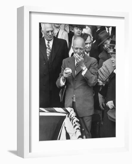 Pres. Dwight D. Eisenhower, Applying a Wet Whammy to First Official Baseball of Washington Season-George Skadding-Framed Photographic Print