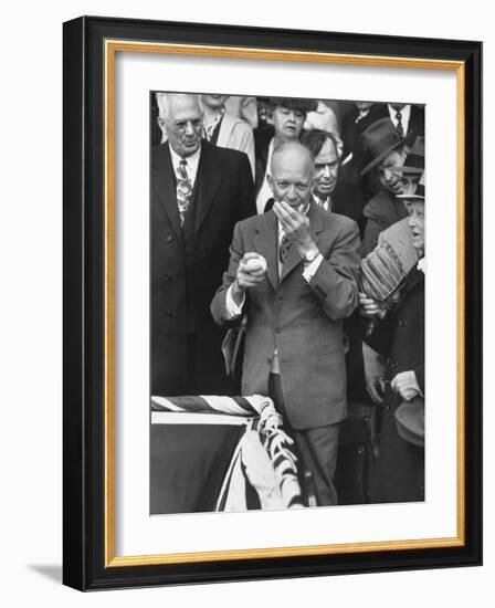 Pres. Dwight D. Eisenhower, Applying a Wet Whammy to First Official Baseball of Washington Season-George Skadding-Framed Photographic Print