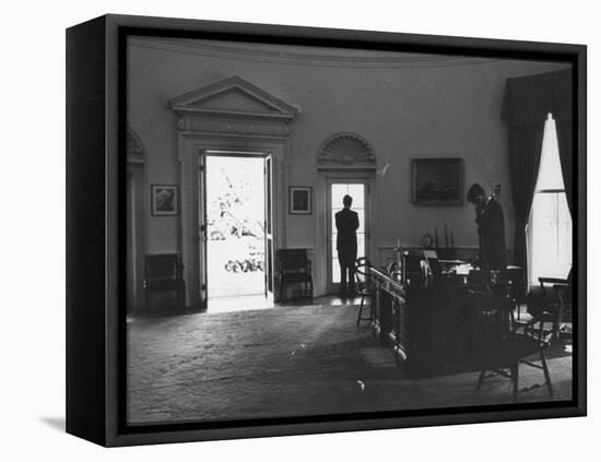 Pres. John F. Kennedy and Attorney Gen. Robert F. Kennedy Conferring in the Oval Office-null-Framed Premier Image Canvas