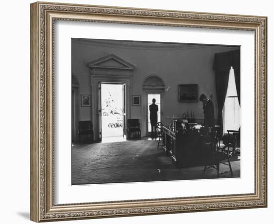 Pres. John F. Kennedy and Attorney Gen. Robert F. Kennedy Conferring in the Oval Office-null-Framed Photographic Print