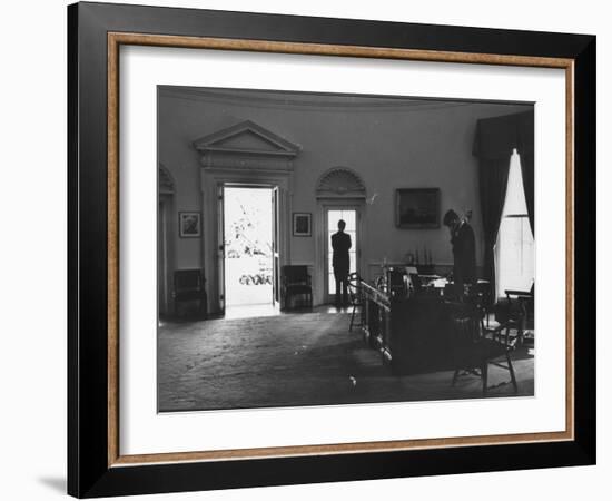 Pres. John F. Kennedy and Attorney Gen. Robert F. Kennedy Conferring in the Oval Office-null-Framed Photographic Print