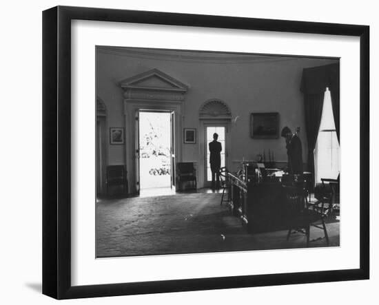 Pres. John F. Kennedy and Attorney Gen. Robert F. Kennedy Conferring in the Oval Office-null-Framed Photographic Print