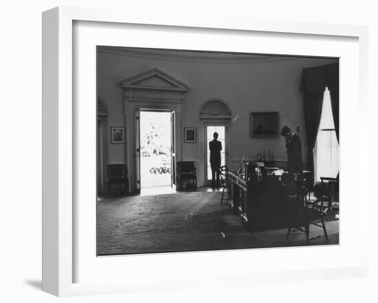 Pres. John F. Kennedy and Attorney Gen. Robert F. Kennedy Conferring in the Oval Office-null-Framed Photographic Print