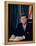 Pres. John F. Kennedy Sitting at His Desk, with Flag in Bkgrd-Alfred Eisenstaedt-Framed Premier Image Canvas