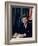 Pres. John F. Kennedy Sitting at His Desk, with Flag in Bkgrd-Alfred Eisenstaedt-Framed Photographic Print