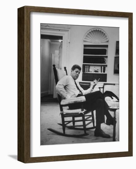 Pres. John F. Kennedy Sitting in Rocking Chair-null-Framed Photographic Print