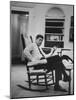 Pres. John F. Kennedy Sitting in Rocking Chair-null-Mounted Photographic Print