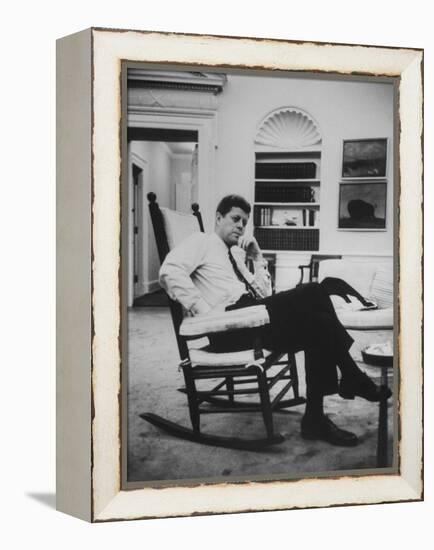 Pres. John F. Kennedy Sitting in Rocking Chair-null-Framed Premier Image Canvas