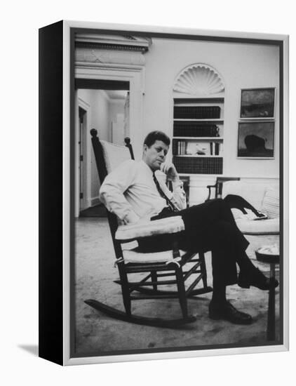 Pres. John F. Kennedy Sitting in Rocking Chair-null-Framed Premier Image Canvas