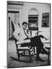 Pres. John F. Kennedy Sitting in Rocking Chair-null-Mounted Photographic Print