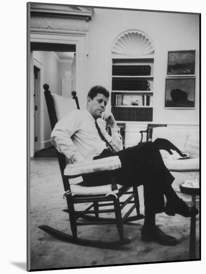 Pres. John F. Kennedy Sitting in Rocking Chair-null-Mounted Photographic Print