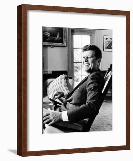Pres Kennedy Sits in Rocking Chair in Oval Office of White House on 46th Birthday, May 29, 1963-null-Framed Photo