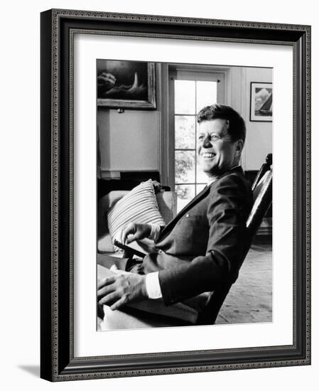 Pres Kennedy Sits in Rocking Chair in Oval Office of White House on 46th Birthday, May 29, 1963-null-Framed Photo