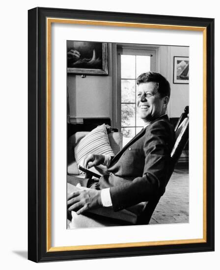 Pres Kennedy Sits in Rocking Chair in Oval Office of White House on 46th Birthday, May 29, 1963-null-Framed Photo