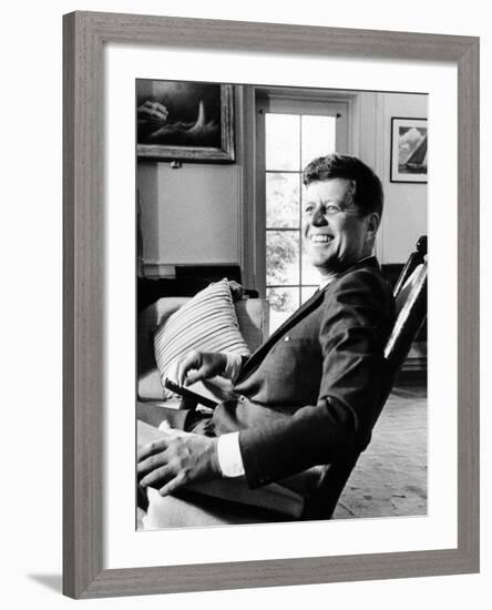 Pres Kennedy Sits in Rocking Chair in Oval Office of White House on 46th Birthday, May 29, 1963-null-Framed Photo