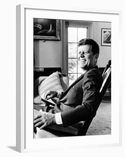 Pres Kennedy Sits in Rocking Chair in Oval Office of White House on 46th Birthday, May 29, 1963-null-Framed Photo