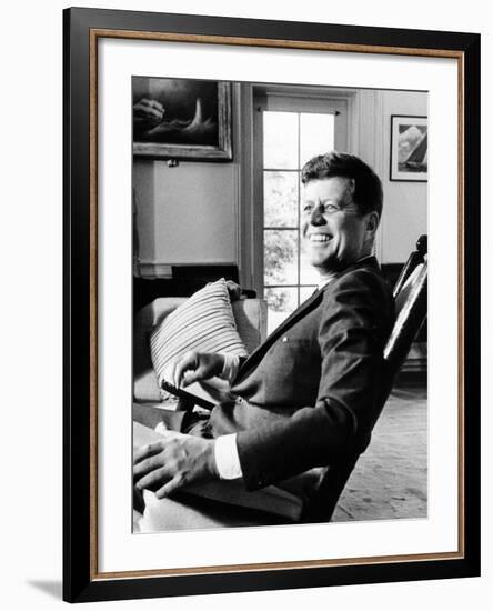 Pres Kennedy Sits in Rocking Chair in Oval Office of White House on 46th Birthday, May 29, 1963-null-Framed Photo