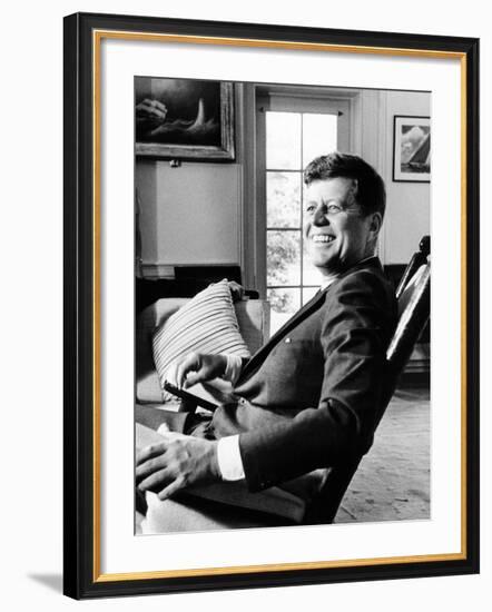 Pres Kennedy Sits in Rocking Chair in Oval Office of White House on 46th Birthday, May 29, 1963-null-Framed Photo